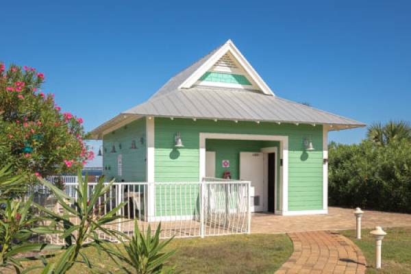 Bath house next to pool.